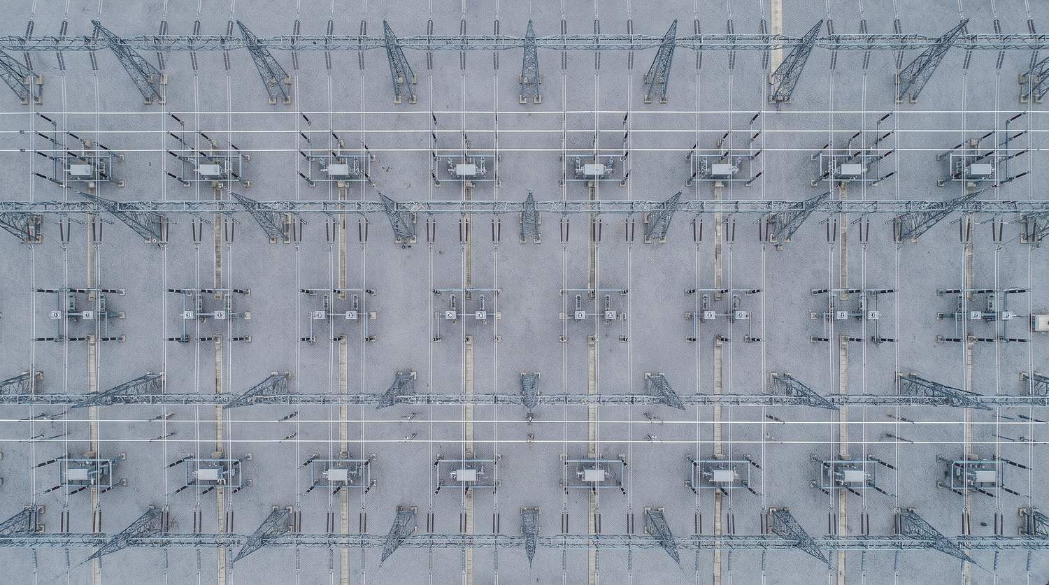 High-voltage switchyard seen from directly overhead