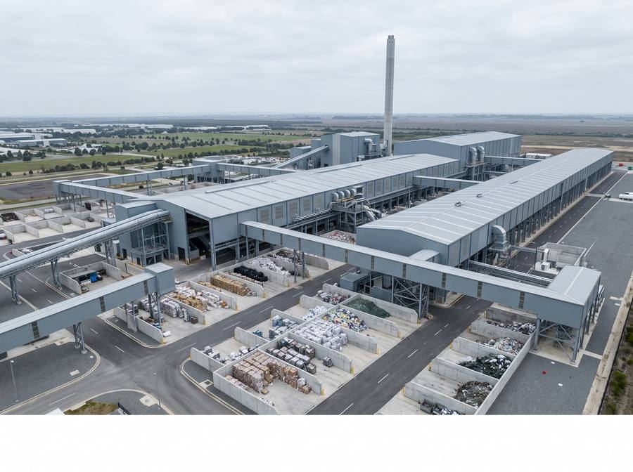 Materials recovery facility with processing halls and conveyors